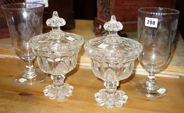 A pair of cut glass bonbon dishes and covers with two cut glass vases.