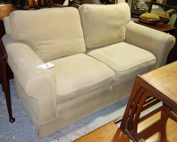 A 20th century cream upholstered three seat sofa, 191cm.