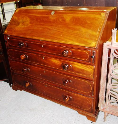 A 19th century mahogany and inlaid bureau, 110cm.