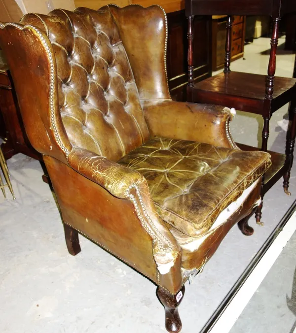 A leather wingback armchair.