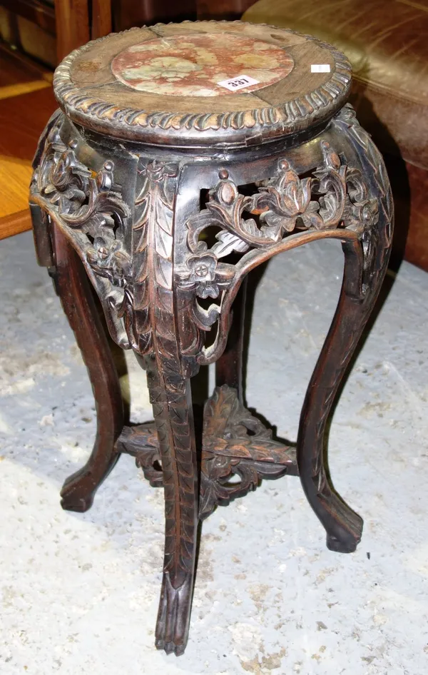 A small hardwood Chinese jardiniere stand with inset marble top, 32cm.
