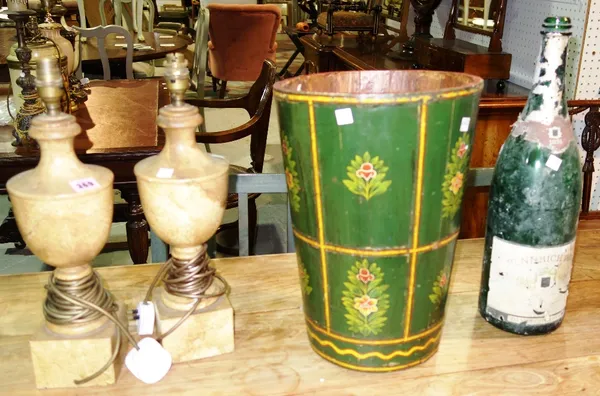 A pair of 20th century faux marble table lamps, a large wine bottle and a green and floral wooden bucket. (4)