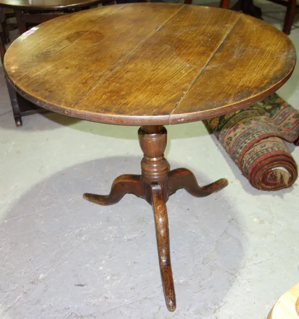 A George III oak snap top occasional table, 71cm wide.