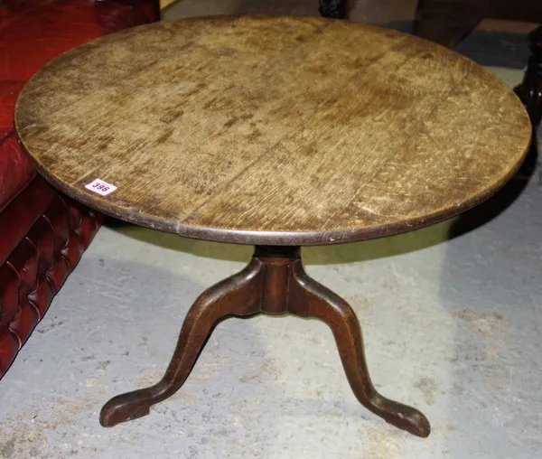 A 19th century circular oak occasional table, 72cm.