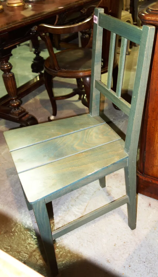 A set of five 20th century green painted pine dining chairs.