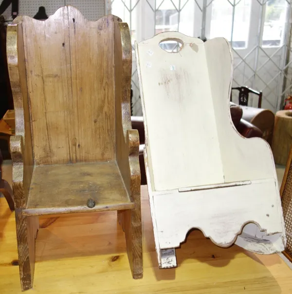 A small white painted pine child's rocking chair and a stained pine solid seated child's chair.