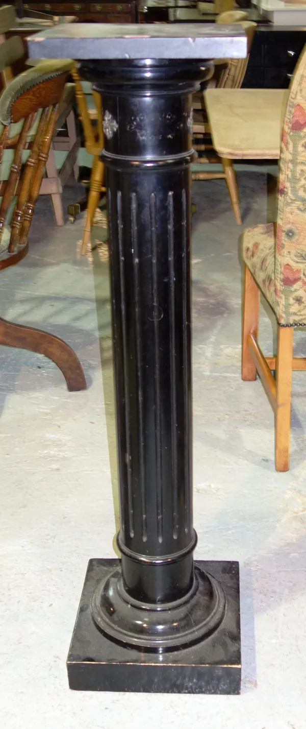 A 19th century ebonised and fluted column, 27cm wide.
