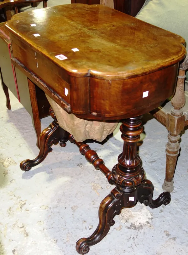 A Victorian walnut sewing table, 65.5cm.