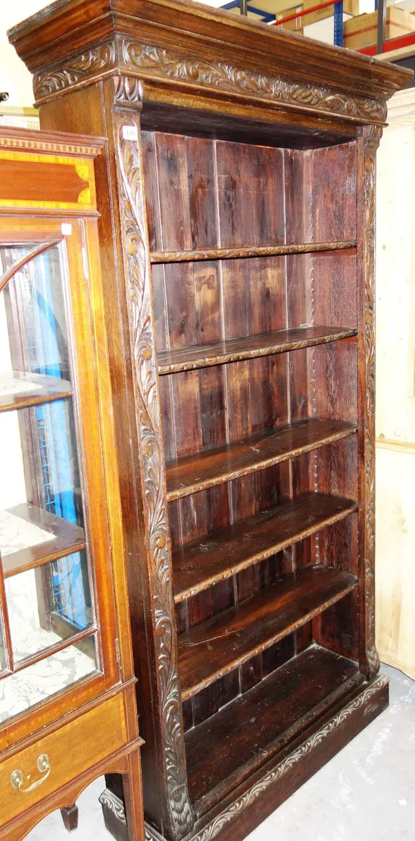 A oak tall open bookcase, 102cm wide x 197cm high.