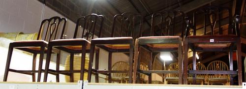 A set of five George III style mahogany dining chairs, to include one carver. (5)