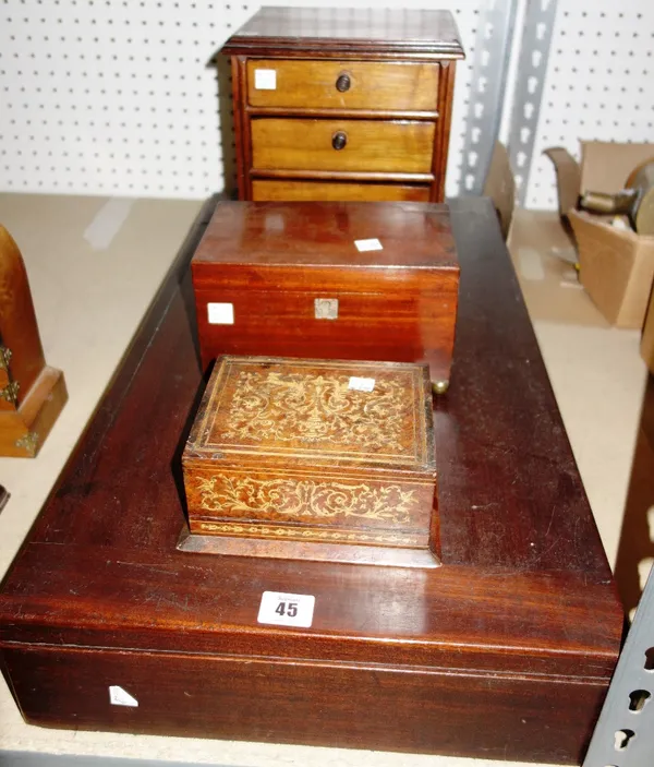 A 19th century mahogany folding bagatelle board, miniature chest, Italian inlaid amboyna table top cigarette box and a 19th century mahogany caddy (4)