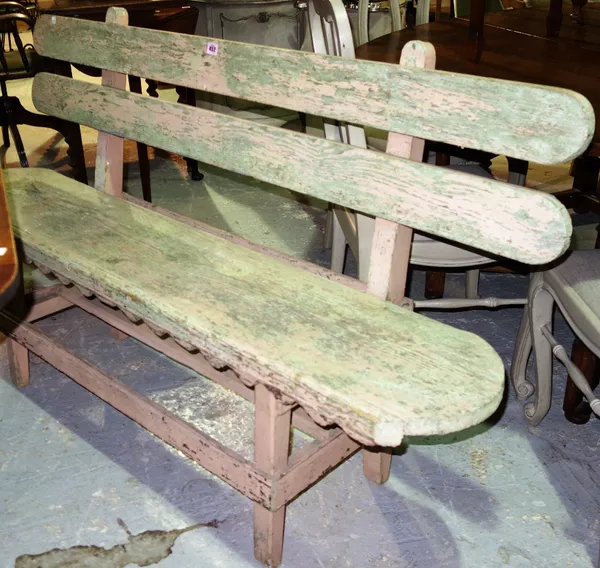 A pink and green painted pine bench, 155cm.