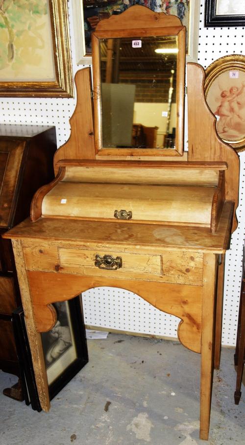 A small 19th century and later pine dressing table, 74.5cm wide.