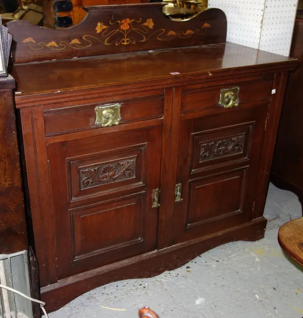 An Art Nouveau mahogany inlaid side cabinet, 120cm.