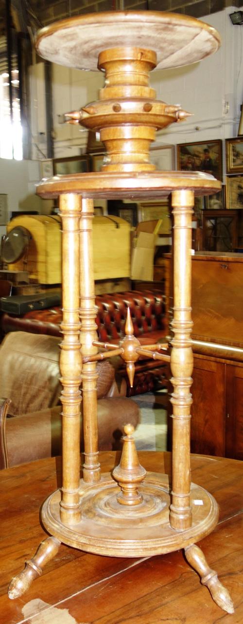 An unusual early 20th century beech jardiniere stand.