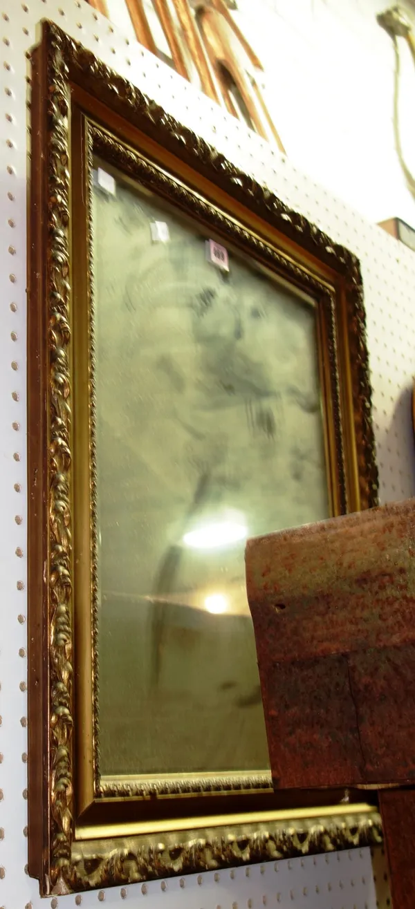 A pair of rectangular gilt framed wall mirrors. (2)  57
