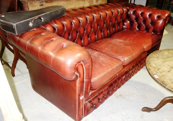 A 20th century red leather Chesterfield sofa, 200cm wide.