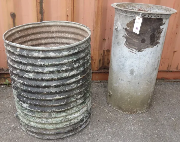 A large ribbed metal planter and another cylindrical planter. (2)