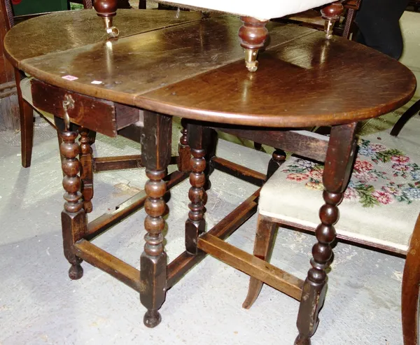 A late 17th century oak gateleg dining table, 121cm wide x 72cm high x 96cm deep.