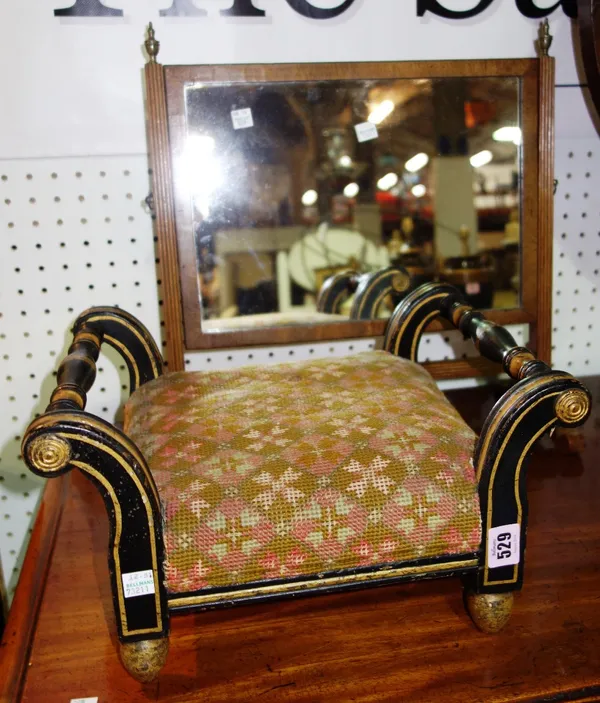 A Victorian ebonised footstool and a toilet mirror. (2)