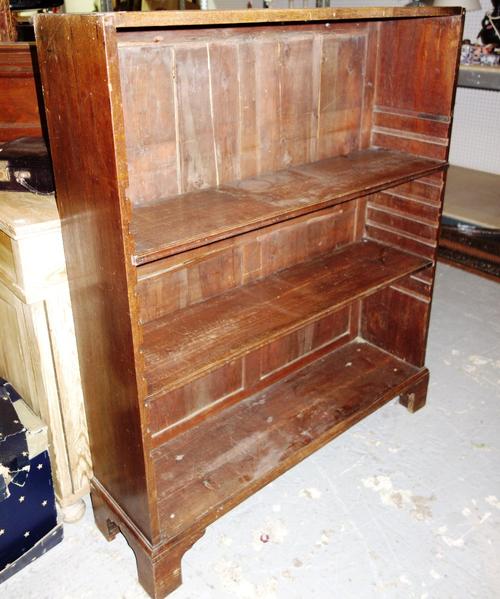 A hardwood open bookcase with adjustable shelving, 97cm.