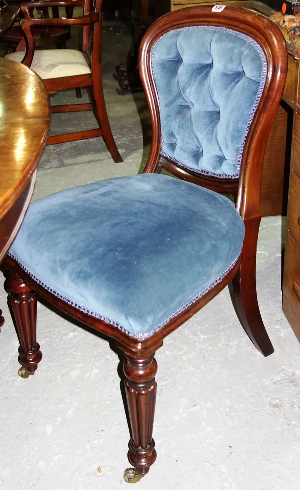 A set of four Victorian mahogany framed button back dining chairs. (4)