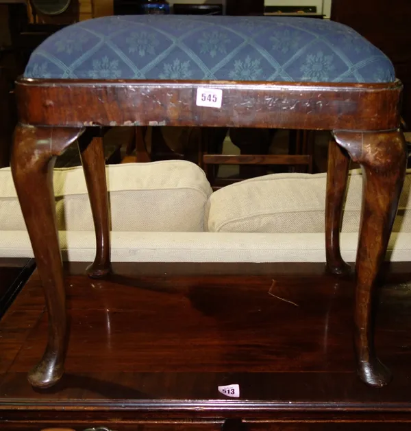 A mahogany framed footstool.