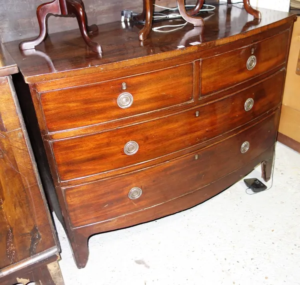 A 19th century mahogany bowfront chest of two short and two long drawers.