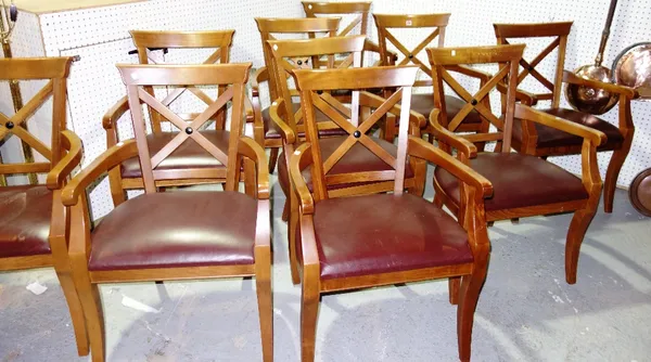 A set of twelve 20th century dining chairs, with 'X' frame backs.