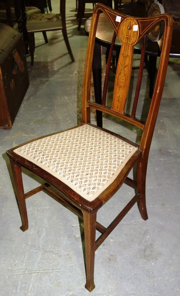 A set of five Edwardian mahogany and inlaid chairs.