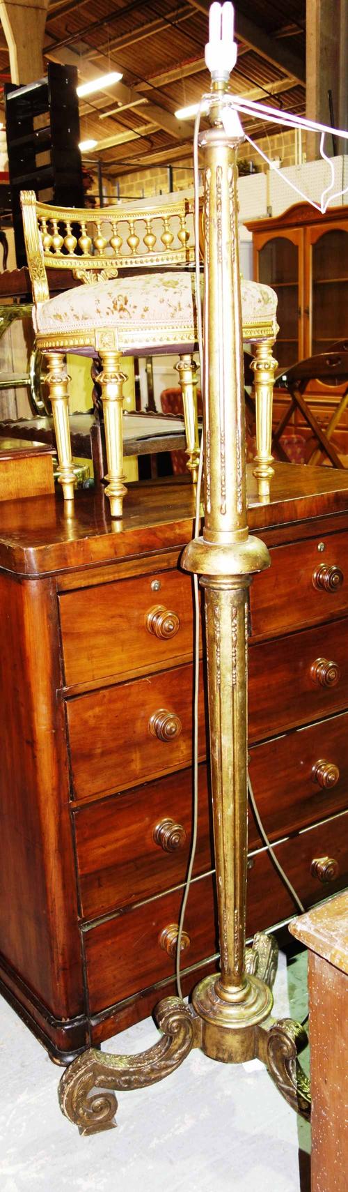 An Italian giltwood dressing table stool and a giltwood standard lamp. (2)  13, 45