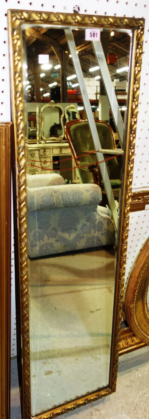 A rectangular giltwood footstool, a white painted footstool and a gilt framed mirror. (3)   12, 56