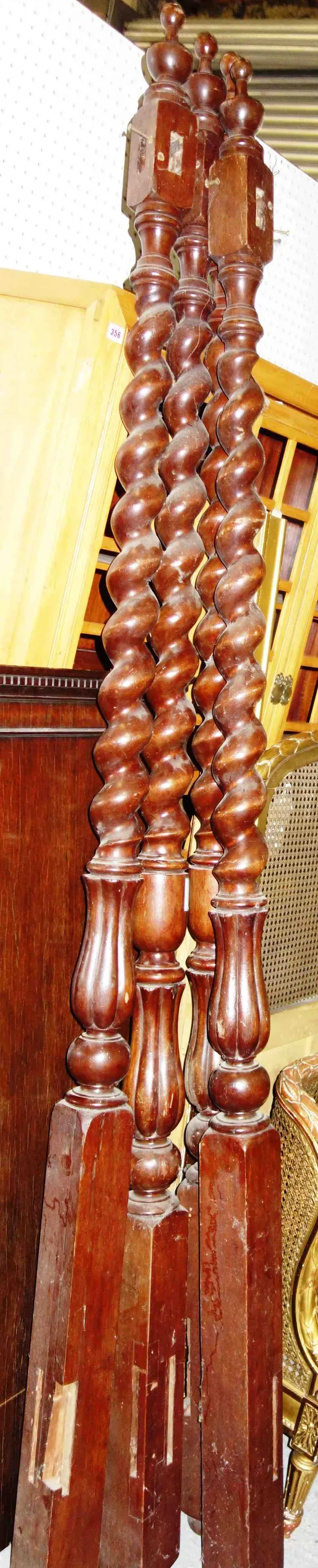 A set of four mahogany spiral twist four poster bed posts, 240cm high, (no frame), (4).