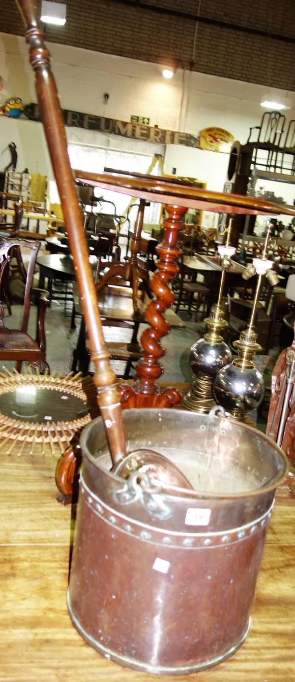 A copper bucket and a warming pan. (2)