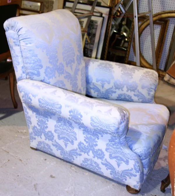 A blue upholstered armchair.