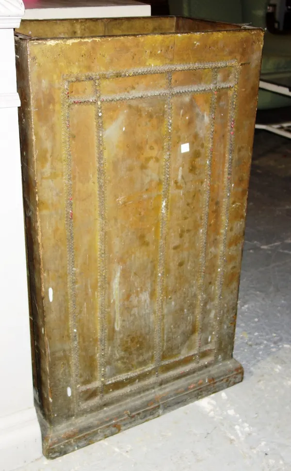 A large embossed copper jardiniere stand.