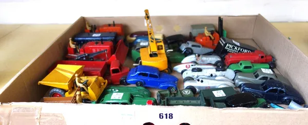 A quantity of Dinky die-cast vehicles, pre and post war, including; a 'Speed of the Wind' racing car, Auto Union, 'Lyons Swiss Rolls' guy truck, a Chr