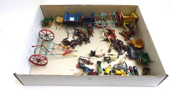 A small quantity of Britains hollow cast lead farmyard animals, people and accessories, including three horse drawn wagons, two further horse drawn pl