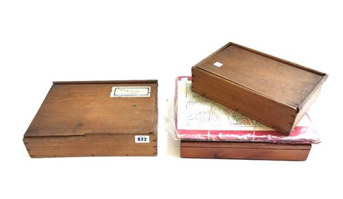 A 19th century wooden puzzle 'Europe' by Laurie & Whittle, another wooden puzzle of similar age (possibly a world map), a later puzzle 'Parables of ou