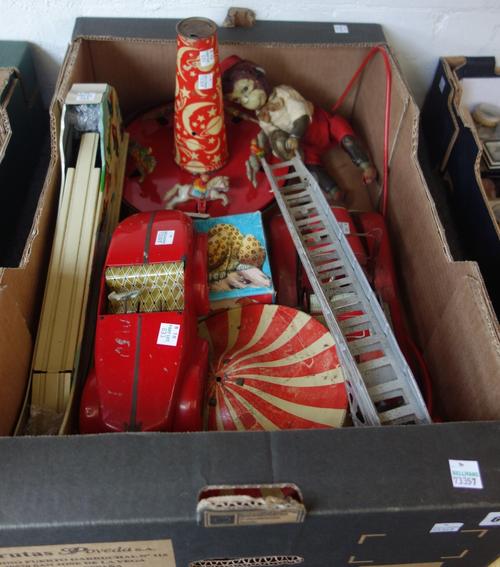 A pre-war tin plate English fire engine, a tin plate roadster, a Russian toboggan run, a tin plate carousel and sundry, (qty)