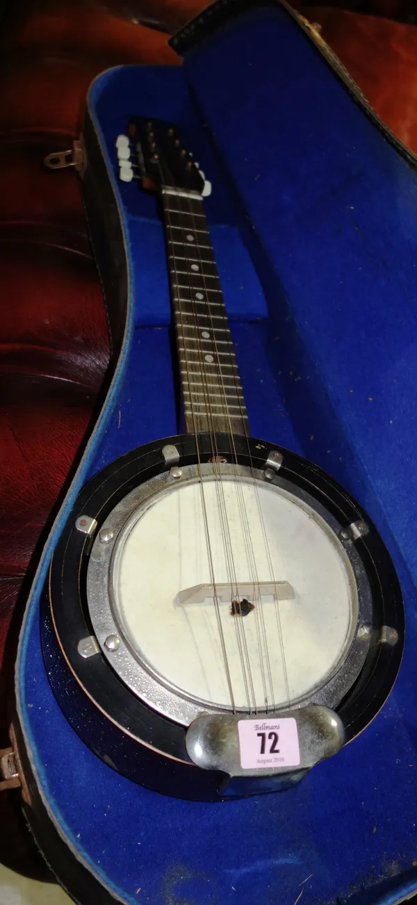 A cased banjo.