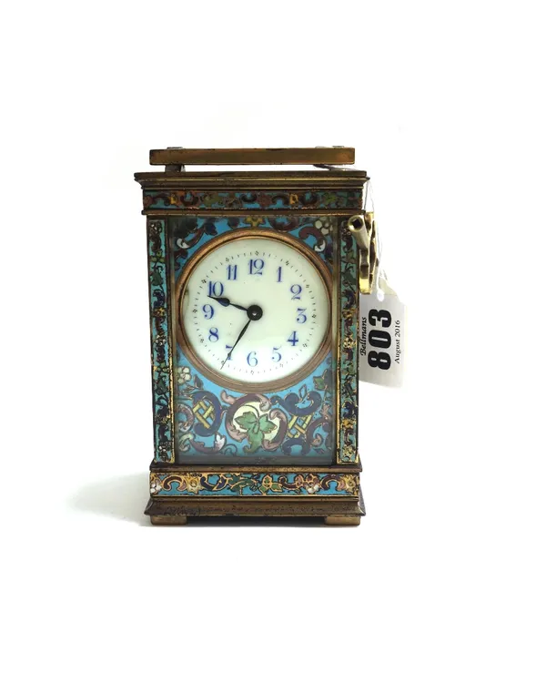 A brass and champlevé decorated carriage clock, circa 1900, with inset bevelled panels, platform escapement and single train movement, 11.5cm high. (k