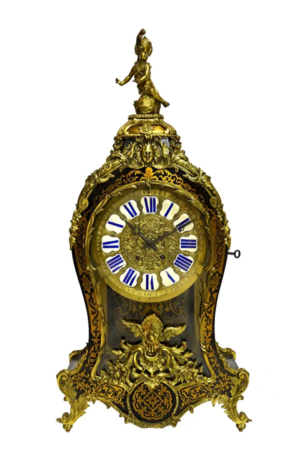 A 19th century French boulle bracket clock, with figural surmount and engraved dial plate inset with enamel Roman numerals, over a two train movement,