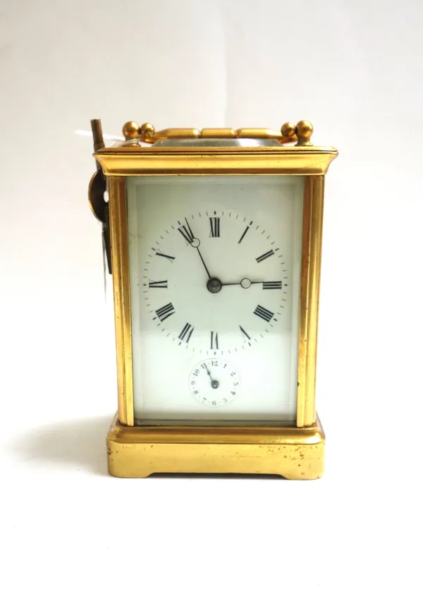 A French gilt brass cased carriage clock, late 19th/early 20th century, with platform escapement and two train movement, the white enamel dial plate w