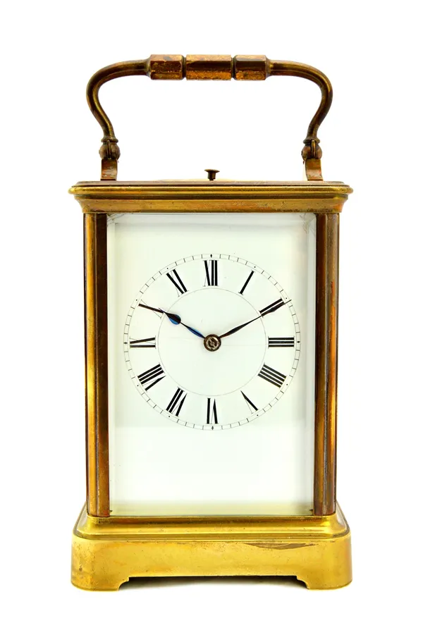 A late 19th century French brass half hour repeat carriage clock by Henri Jacot, Paris, no.11215, with white enamel dial, Roman numerals and a two tra