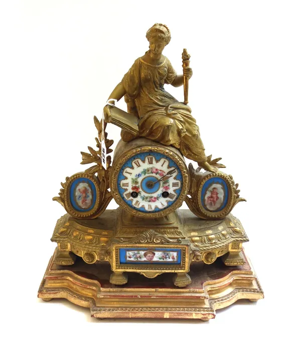 A French gilt metal figural mantel clock, late 19th century, with painted porcelain dial and matching inset porcelain plaques, with a two train moveme