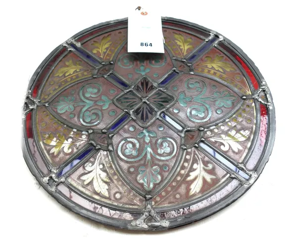 A Victorian stained glass circular panel of foliate geometric design, reputedly from St Mary's Church, Pulborough, 38.5cm diameter.