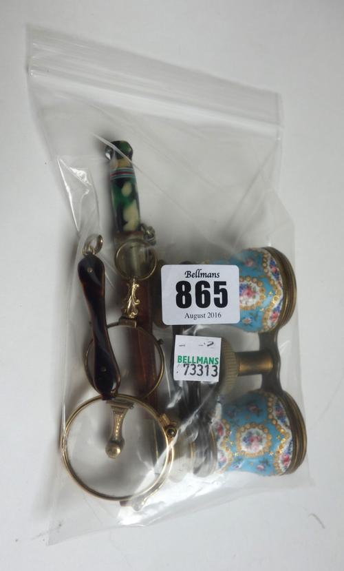 A pair of Continental brass and enamel decorated opera glasses, circa 1900, adjustable, with mother of pearl eyepieces, 9.5cm wide, together with two