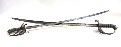 A George IV infantry officer's sword, circa 1820, by 'Vernon, 4 Charing Cross, Lond.', with engraved slightly curved steel blade (82cm), gilt metal hi