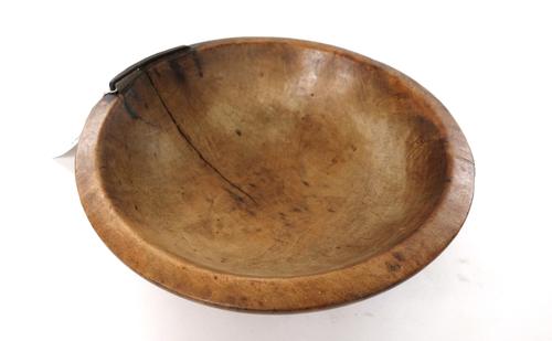 A George III sycamore chessel, English, circa 1800, 34cm diameter x 12cm high, together with a 19th century sycamore dairy bowl, 34.5cm diameter, and